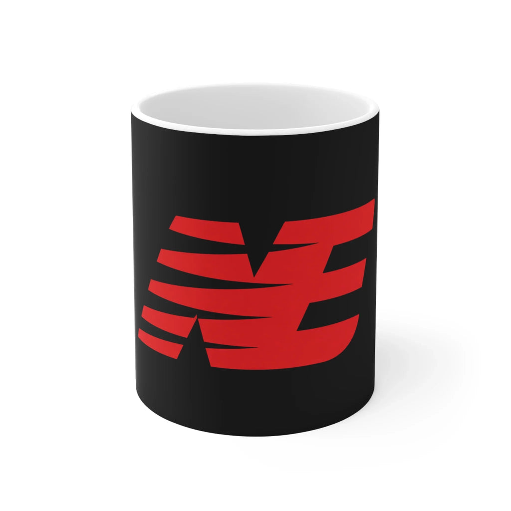 Black ceramic mug with bold red graphic design on white background