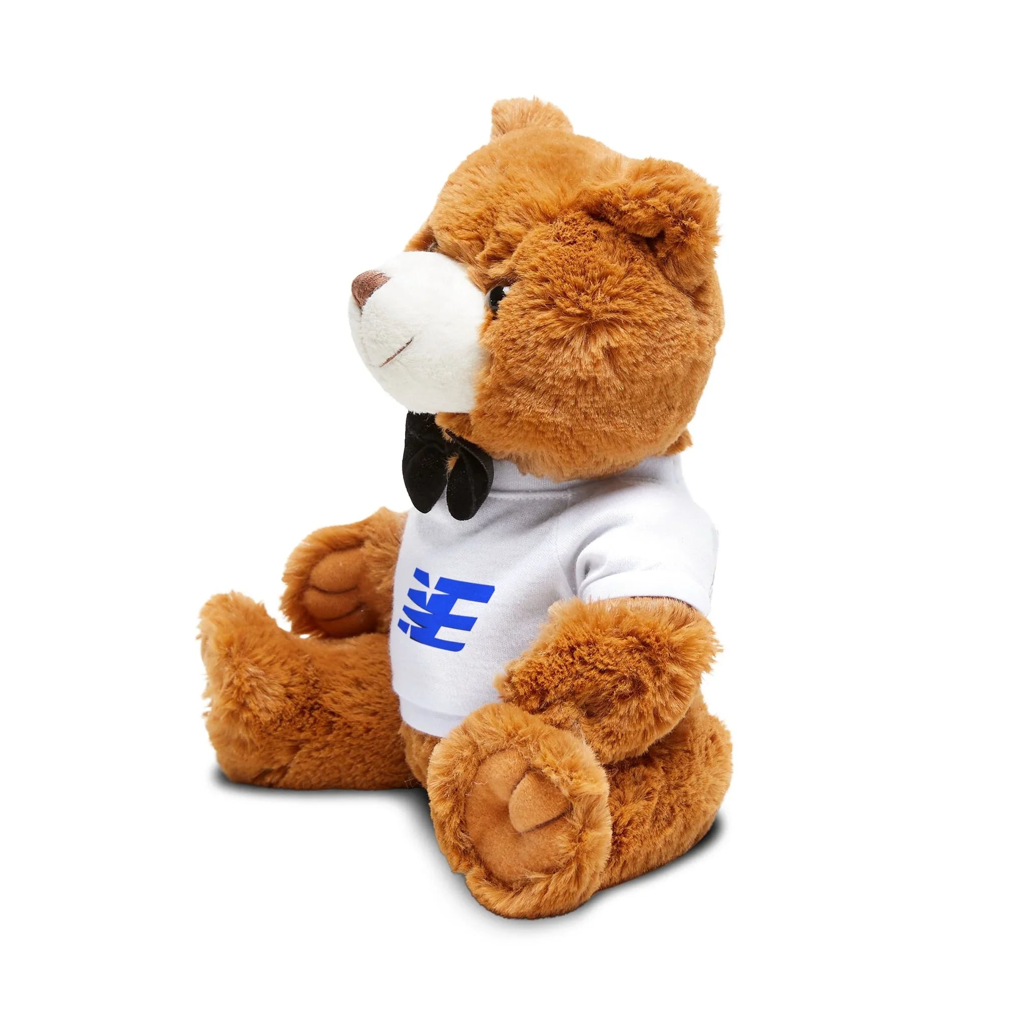 Plush brown teddy bear wearing a white graphic T-shirt and black bowtie, streetwear style