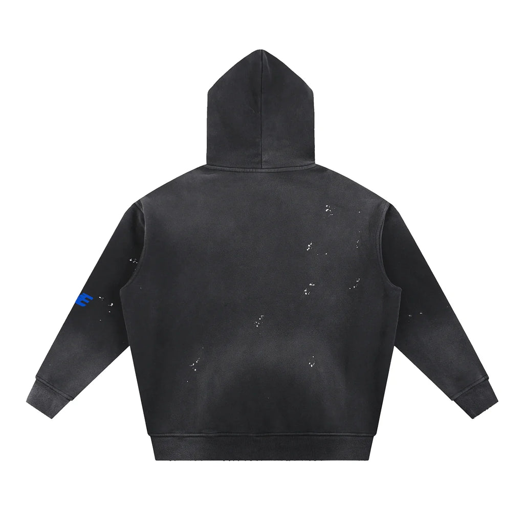 Black distressed streetwear hoodie with small holes and blue sleeve detail, back view