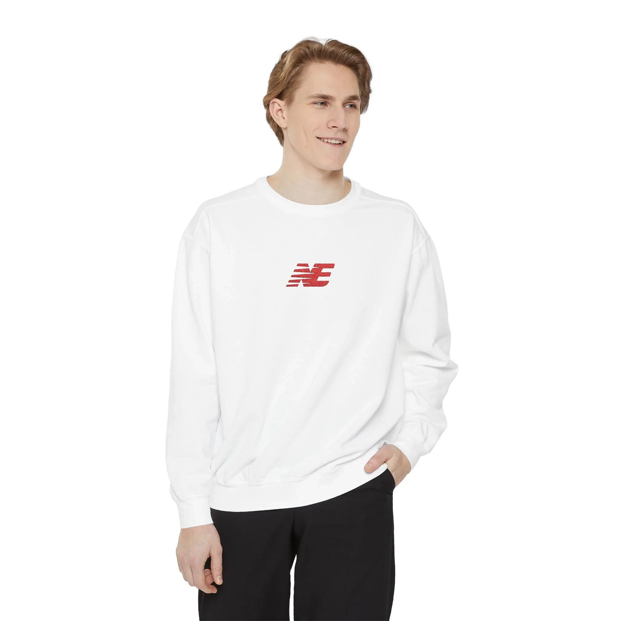 Man wearing white streetwear sweatshirt with red graphic logo, urban casual fashion