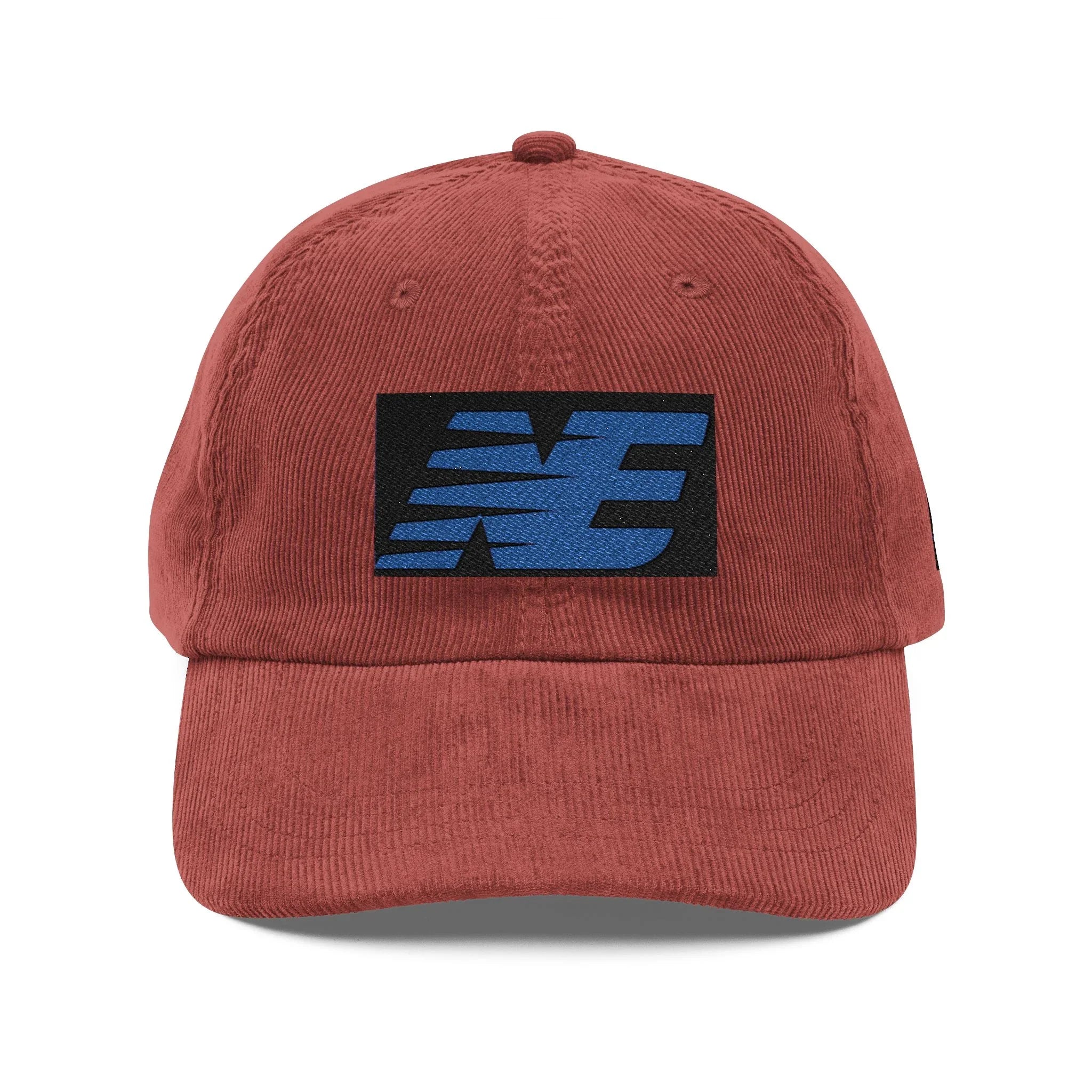 Rust corduroy baseball cap with blue and black embroidered streetwear logo on front